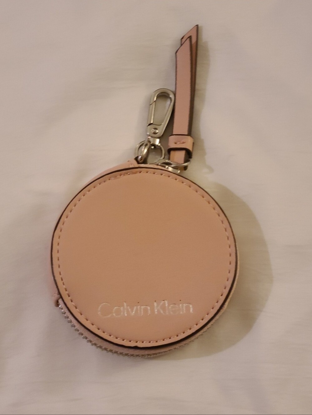New, without tags, Calvin Klein Blush Pink Round Zip Coin Purse / Bag Charm